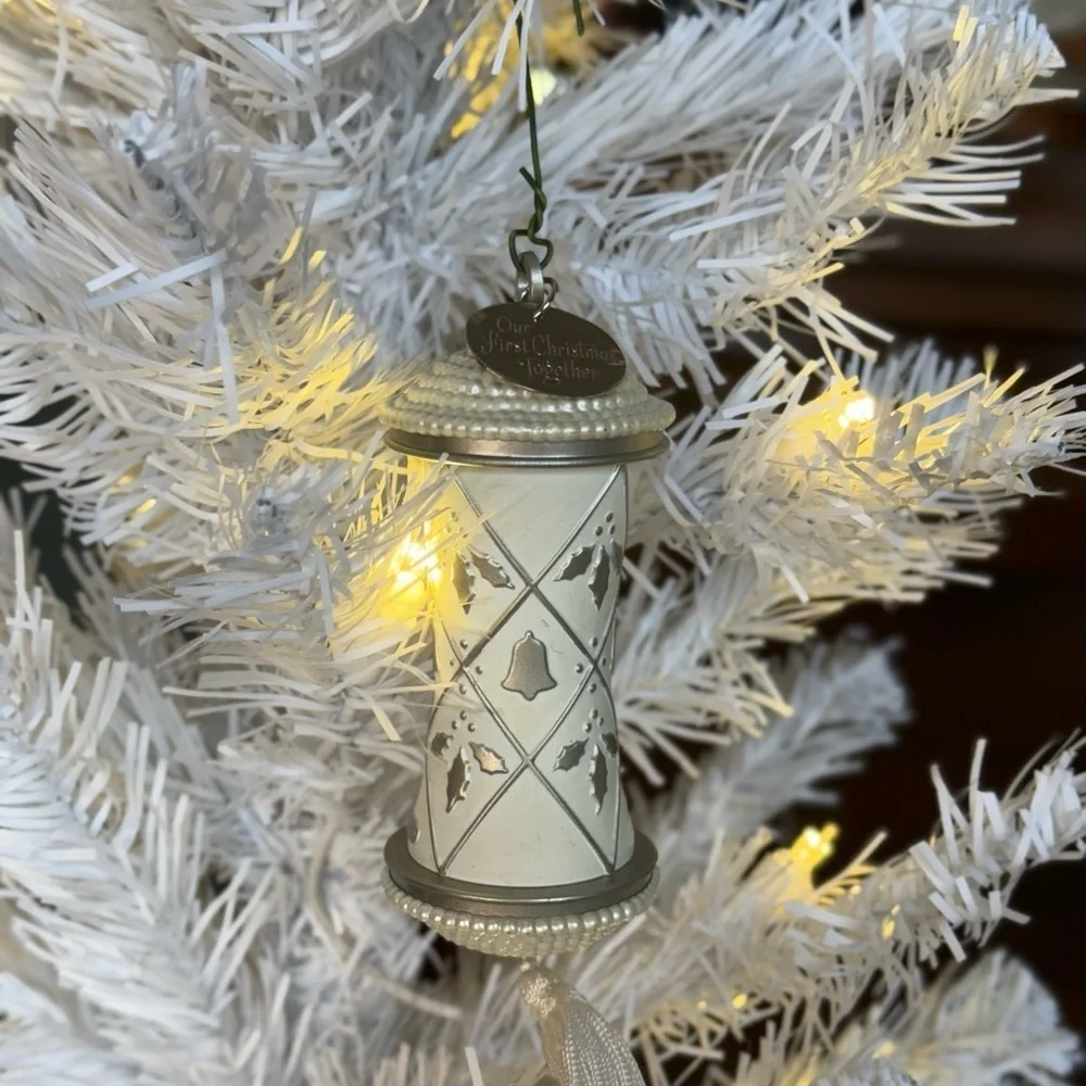 2000 Hallmark “ Our First Christmas”  White and Silver Ornament with Tassel